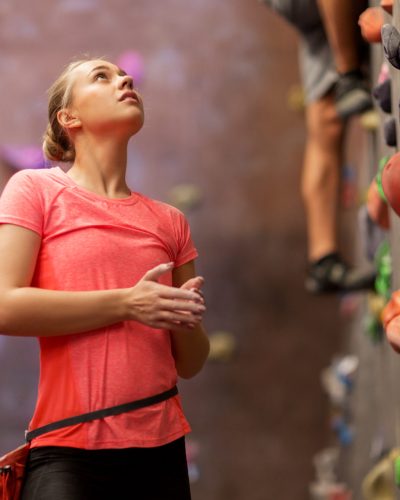 young woman exercising at indoor climbing gym 2021 08 26 22 51 41 utc